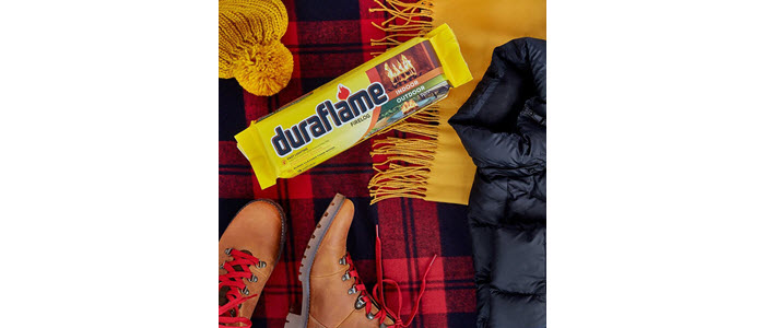 duraflame® 4.5lb single firelog birds eye view with winter blanket, vest, hat, scarf and boots