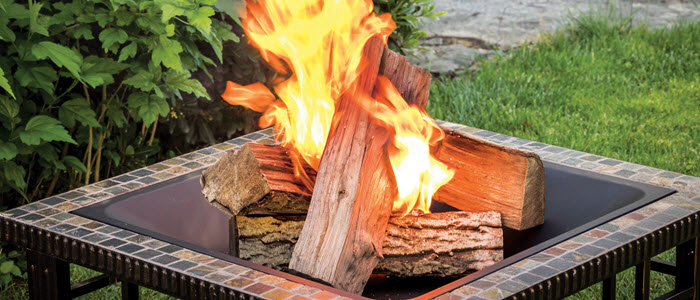 Wood fire in firepit after lighting with a FIRESTART® GOLD FIRELIGHTER