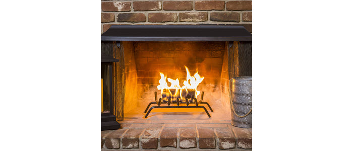 duraflame® 4.5lb firelog burning in an indoor fireplace