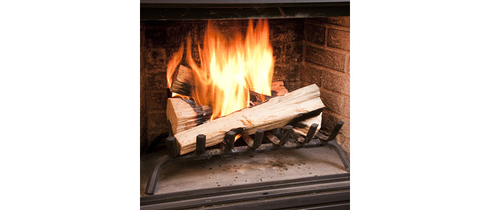 Wood fire in fireplace after lighting with a QUICK START® FIRELIGHTER