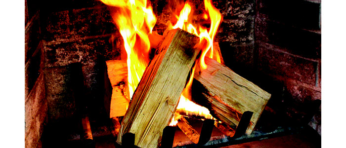 Wood fire in fireplace after lighting with a FIRESTART® GOLD FIRELIGHTER